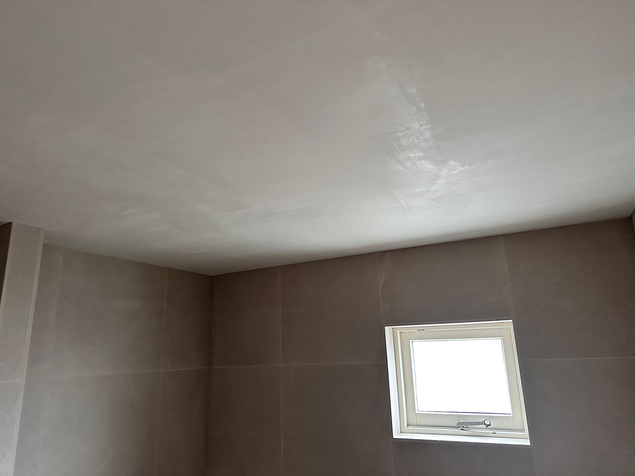 Stucwerk wand strak